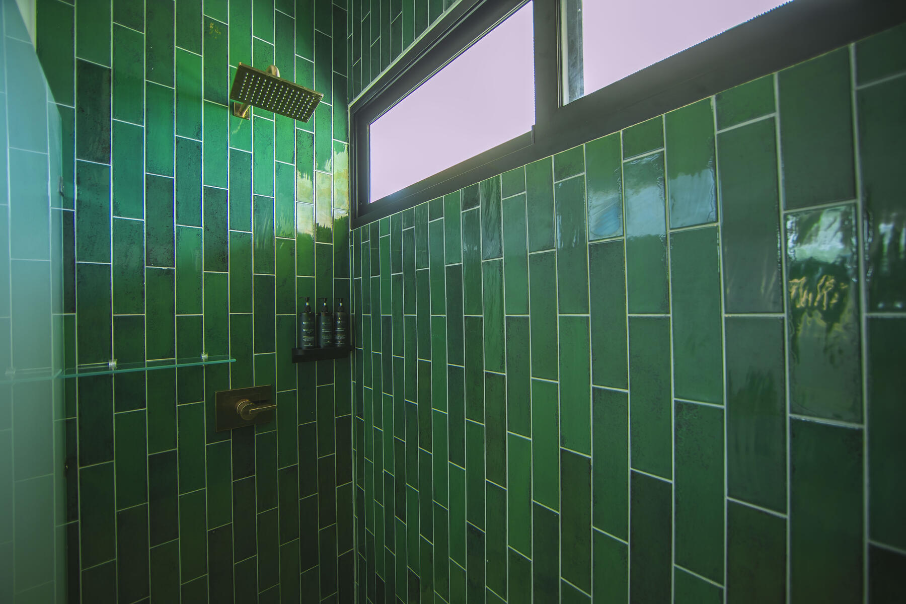 Ensuite bathroom with emerald tiling