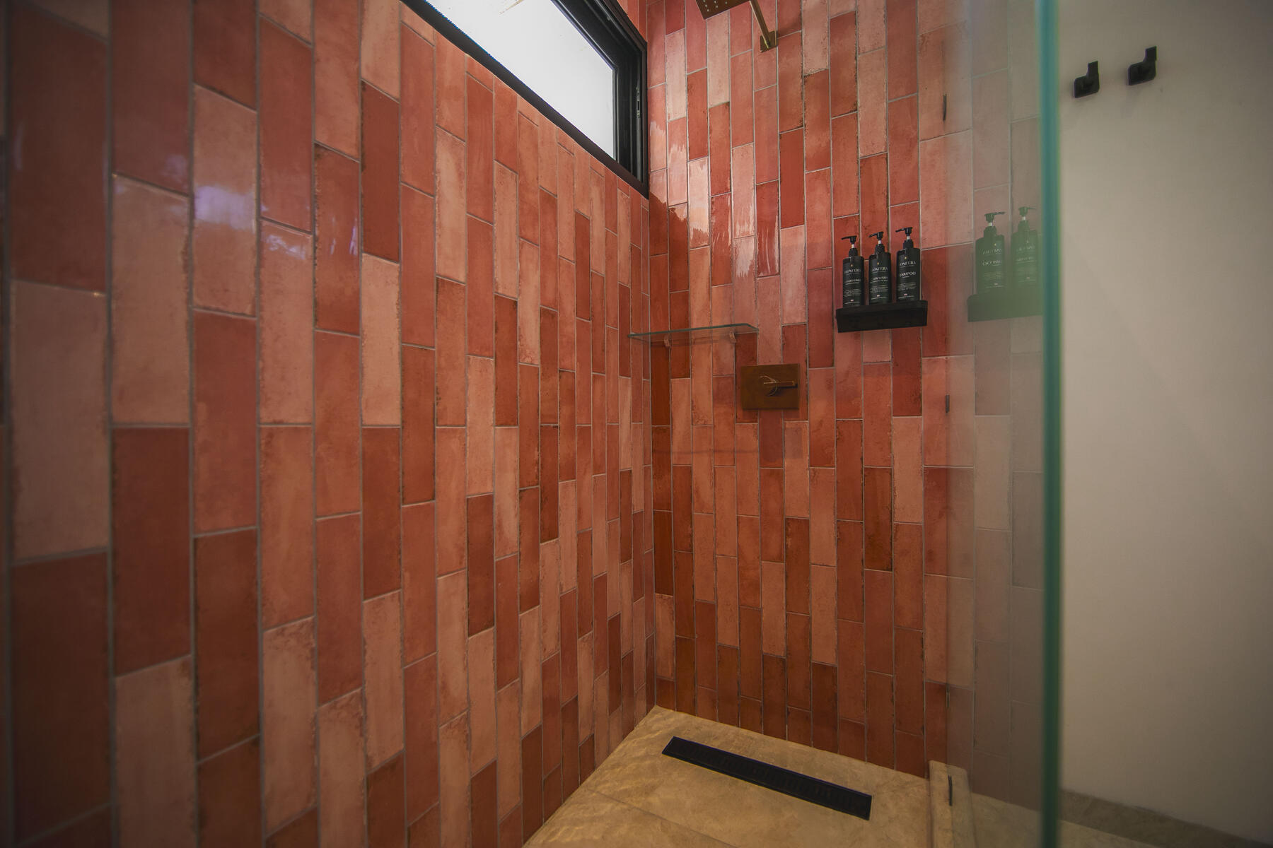Bedroom with copper-toned feature wall