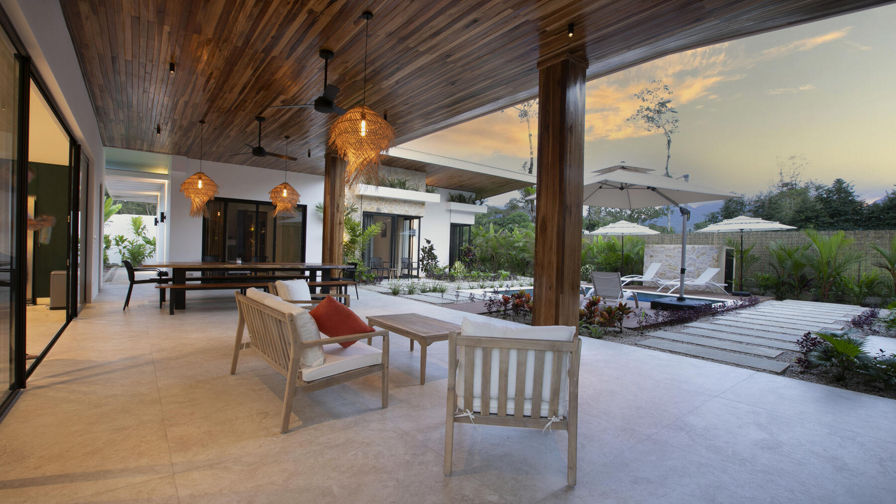 Shaded outdoor lounge with day beds