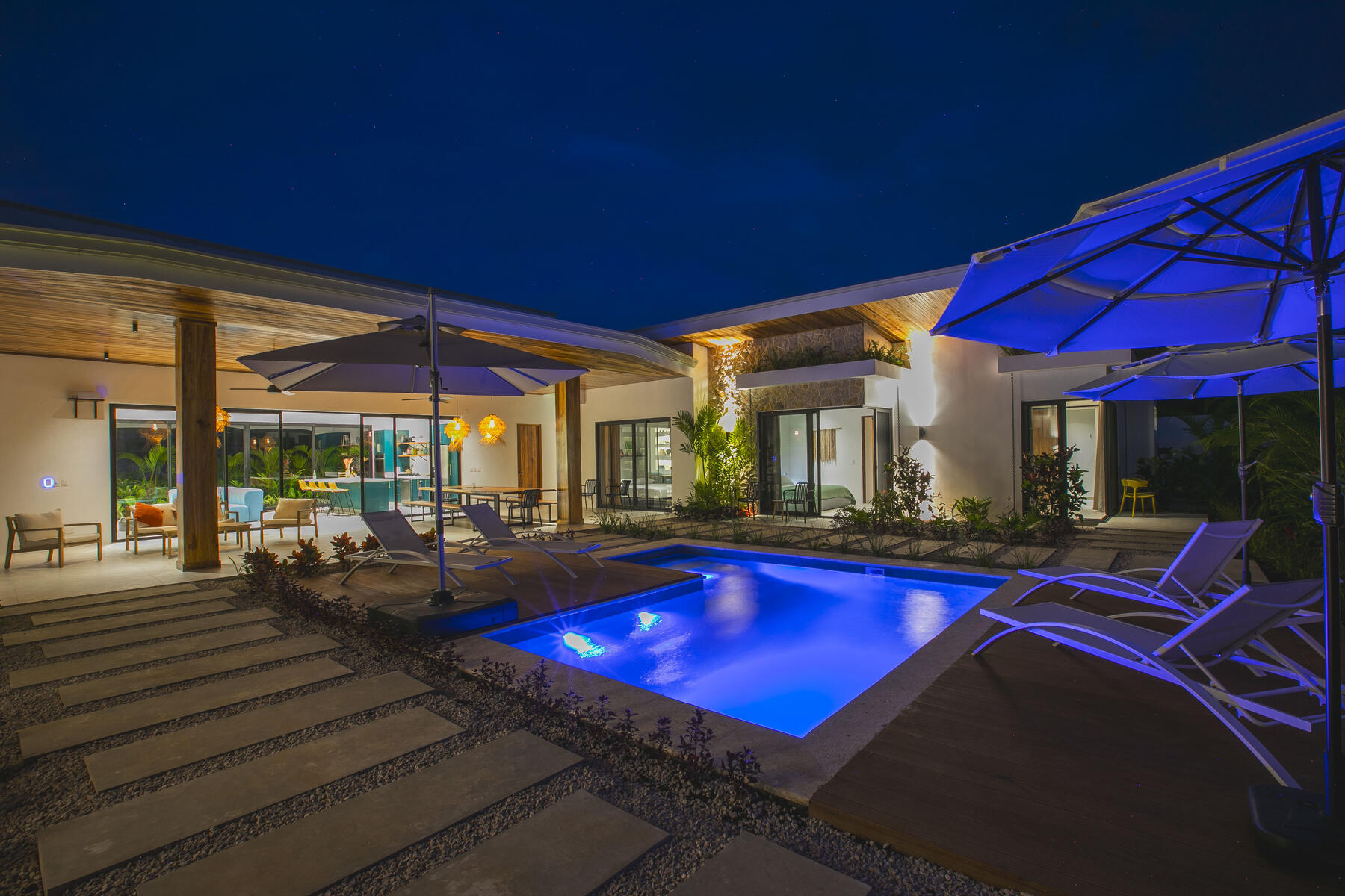 The pool lit at dusk